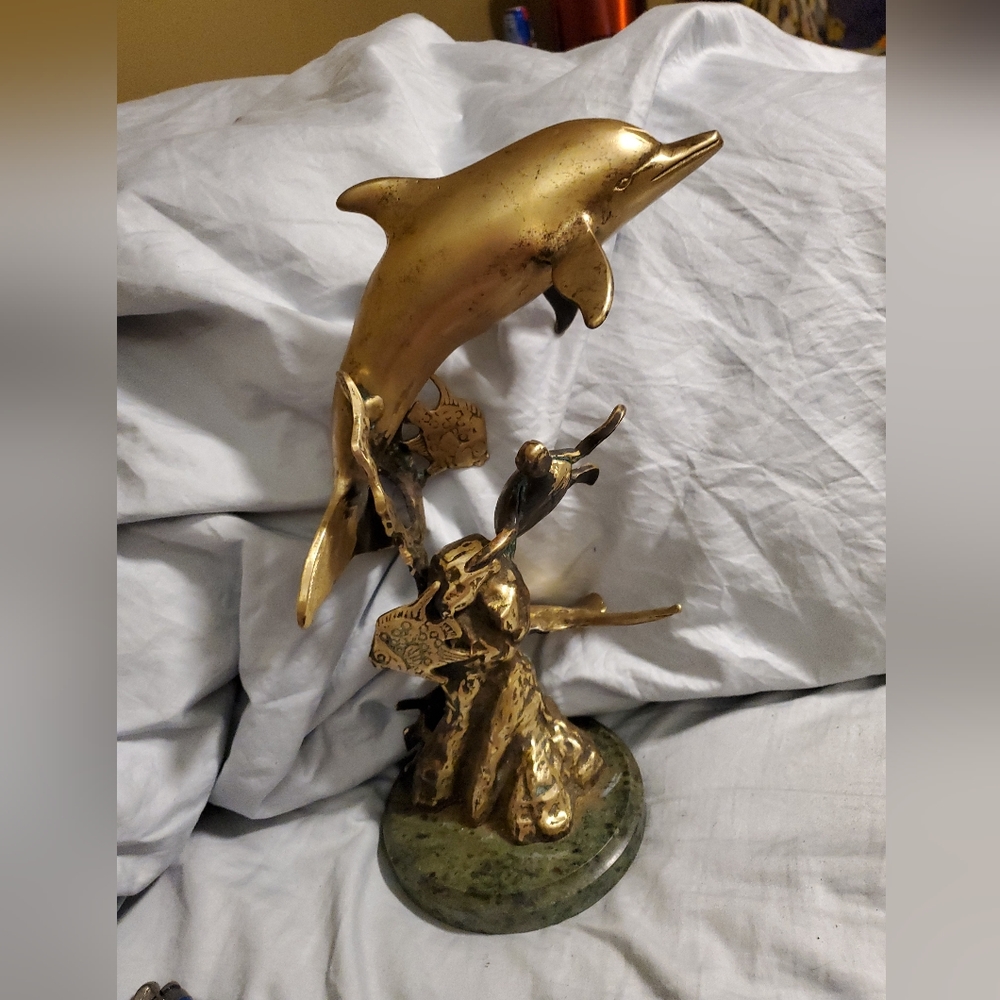 A San Pacific International Brass Sculpture